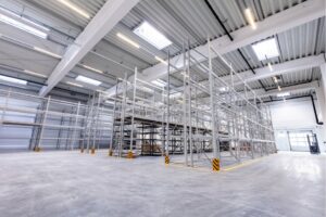 Empty warehouse with shelving and racking